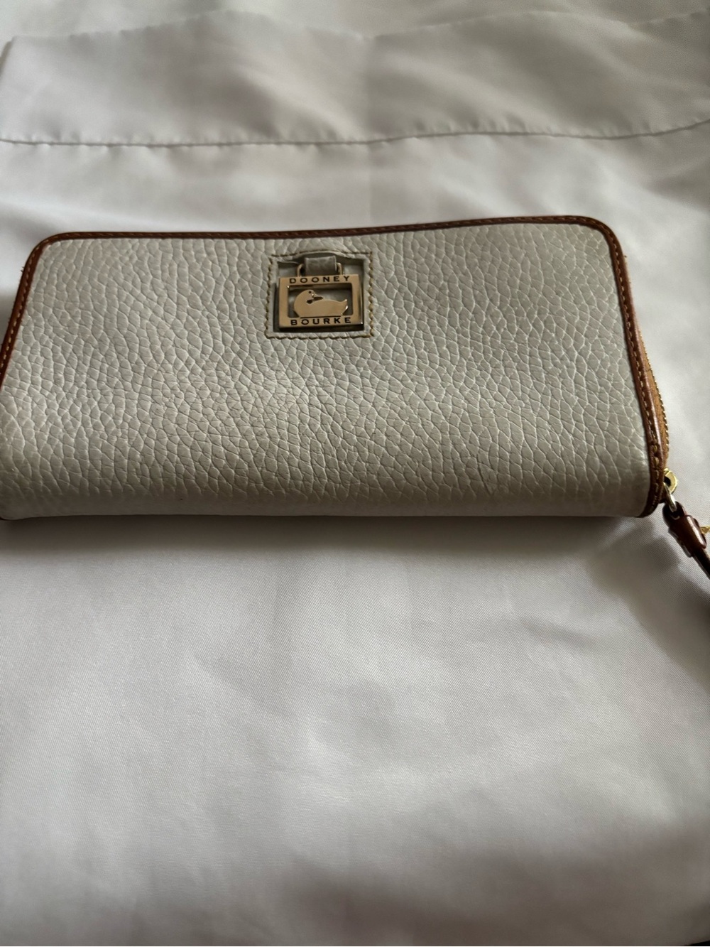 Dooney & Bourke Cream Wallet with Brown Trim and Gold Logo